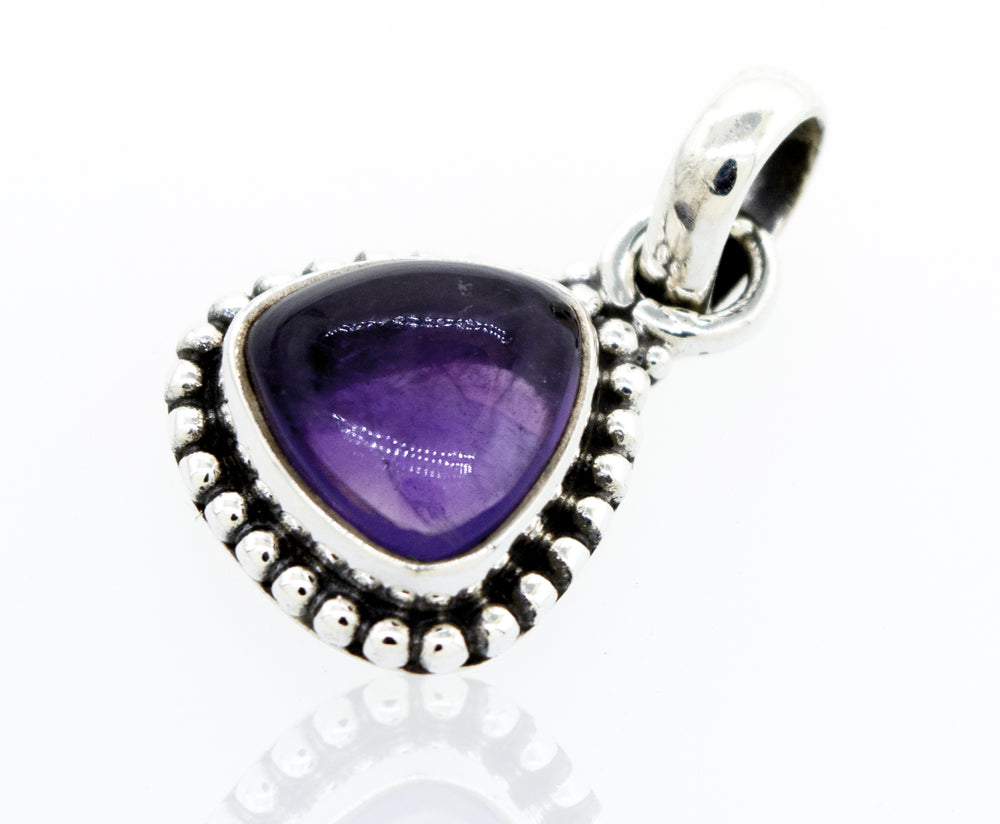 Beautiful Triangular Shape Amethyst Pendant With Beads Design in a Super Silver setting.