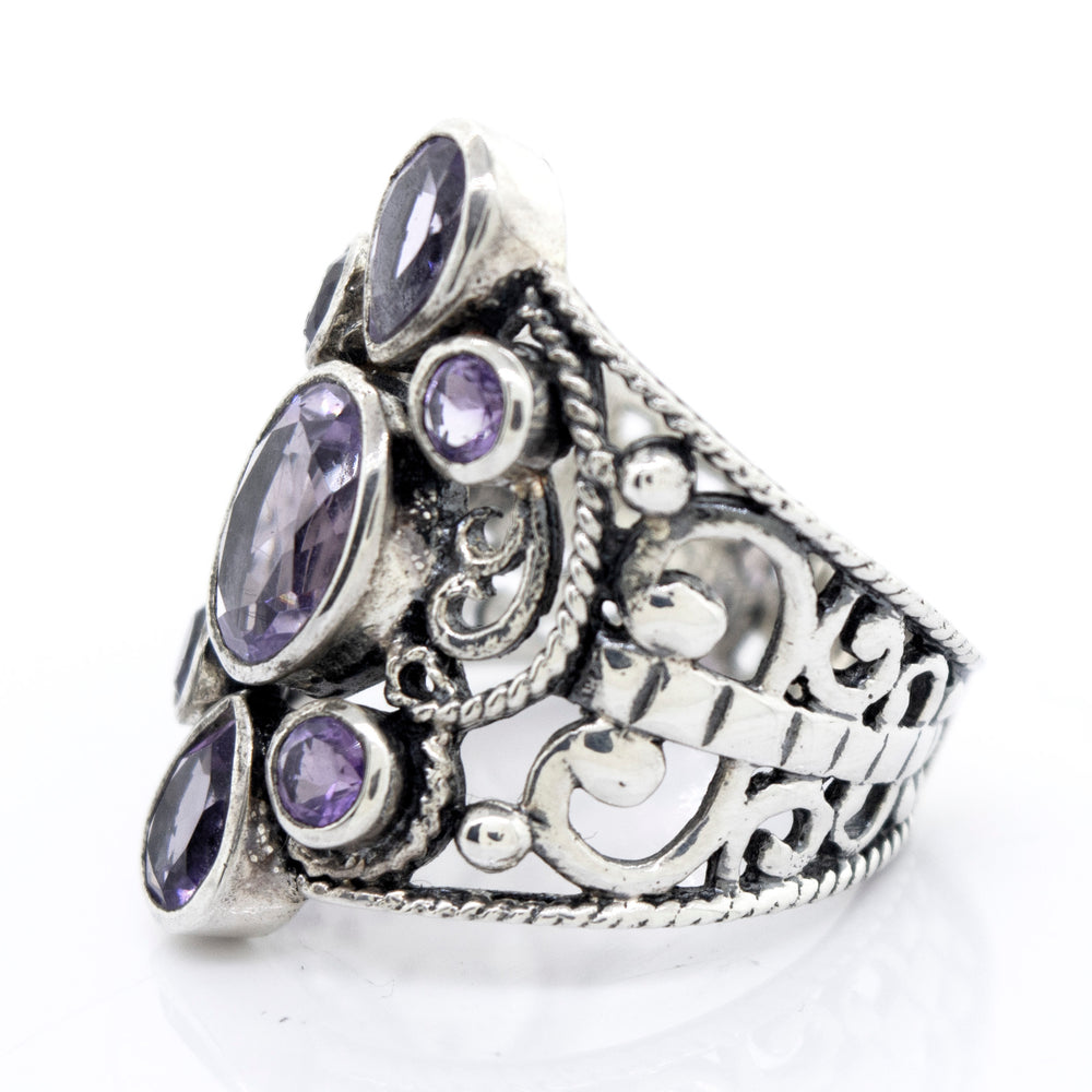 
                  
                    A Super Silver Amethyst Ring With Freestyle Design with amethyst stones.
                  
                