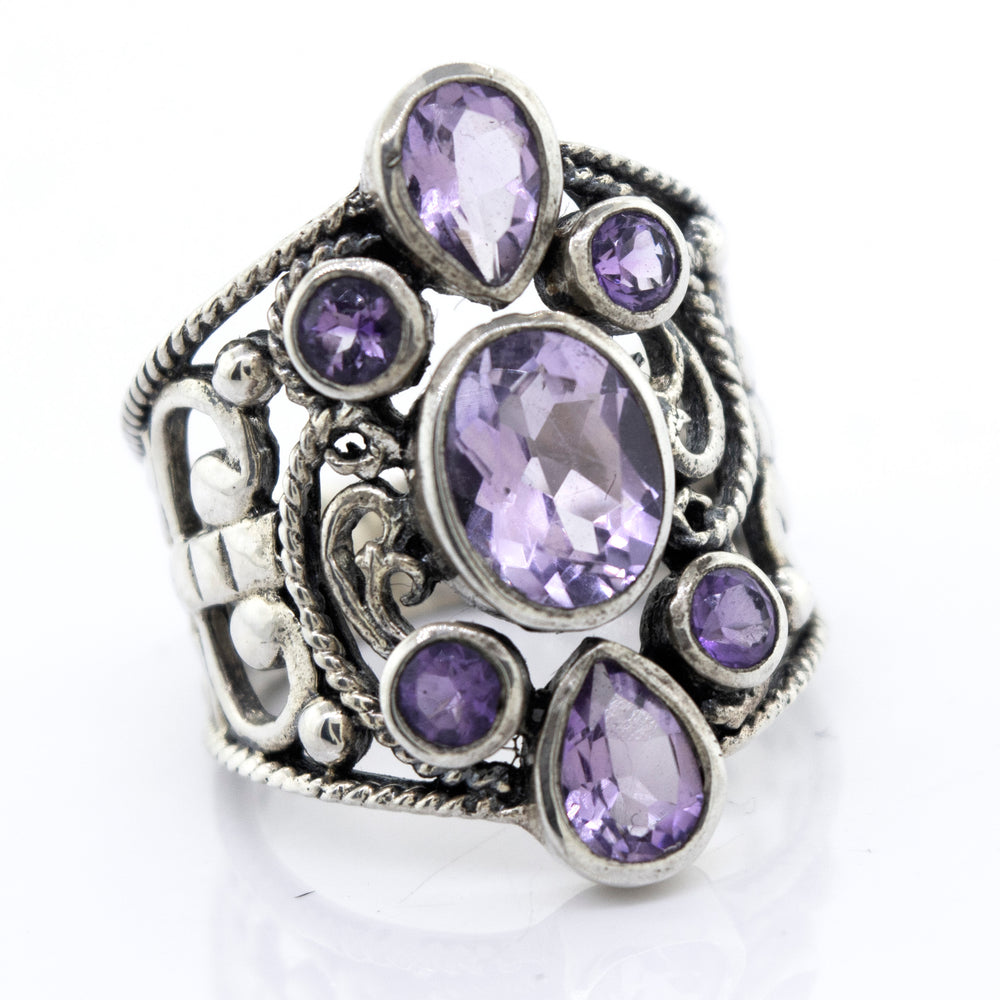 
                  
                    Super Silver's Amethyst Ring With Freestyle Design, adorned with stunning amethyst stones.
                  
                
