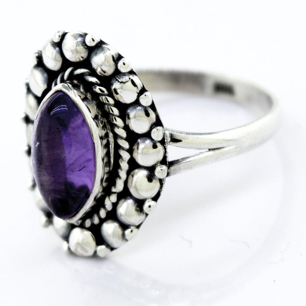 
                  
                    Beautiful Marquise Shaped Vibrant Amethyst Stone Ring in a Super Silver setting.
                  
                