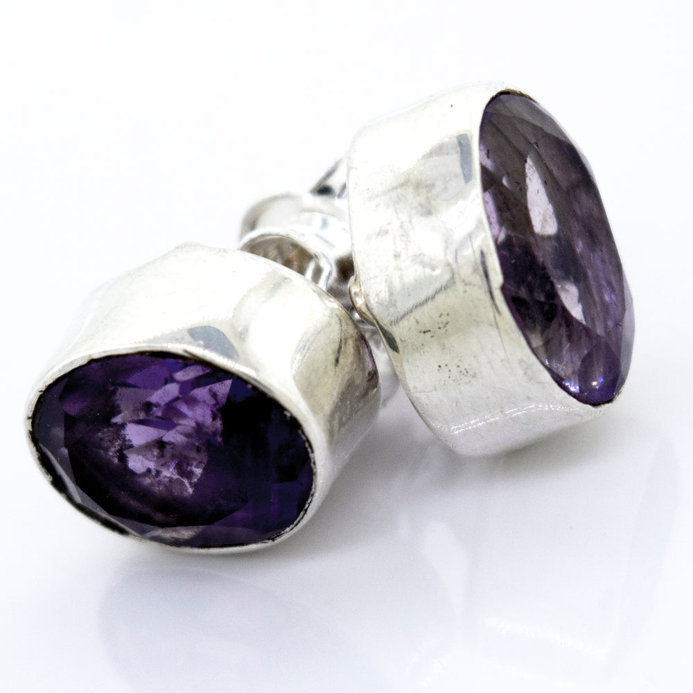 
                  
                    Beautiful Facet Cut Oval Amethyst Studs by Super Silver in a .925 sterling silver setting.
                  
                