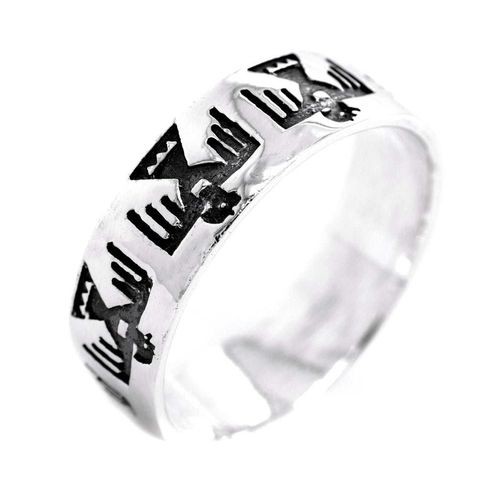 
                  
                    A silver Super Silver Thunderbird Ring with black and white designs featuring a thunderbird.
                  
                