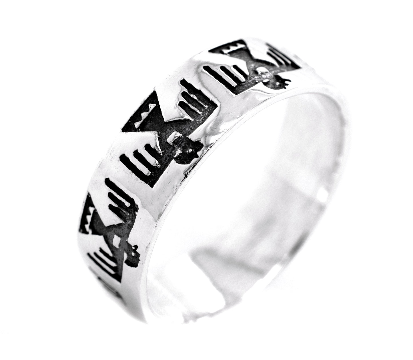 
                  
                    A silver Super Silver Thunderbird Ring with black and white designs featuring a thunderbird.
                  
                