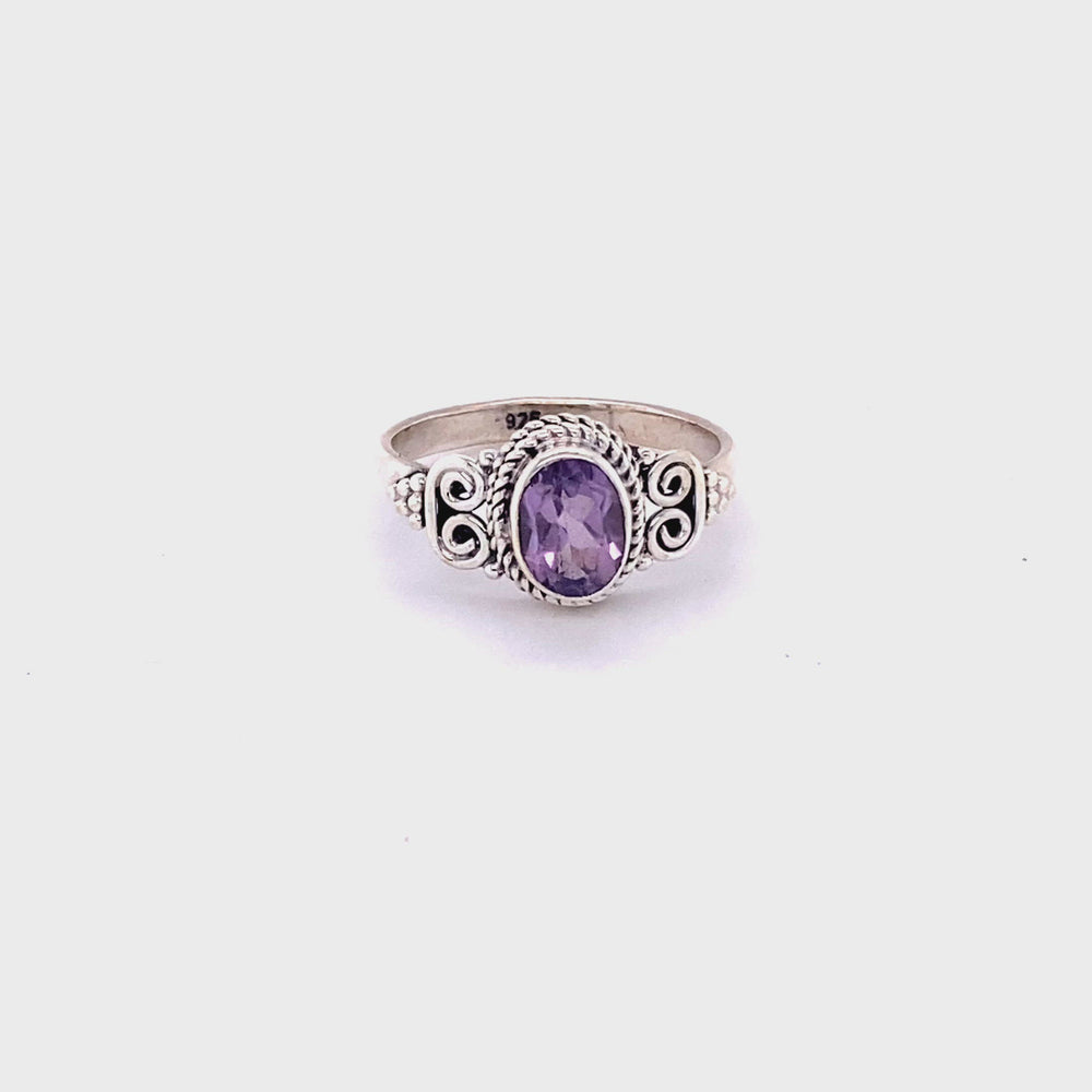 
                  
                    Load and play video in Gallery viewer, Oval Faceted Gemstone Ring with a Swirl Design
                  
                