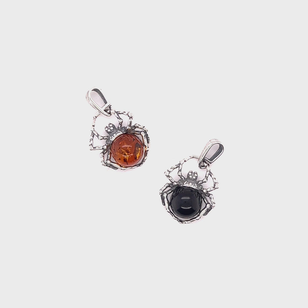 
                  
                    Load and play video in Gallery viewer, Delicate Baltic Amber Spider Pendant
                  
                