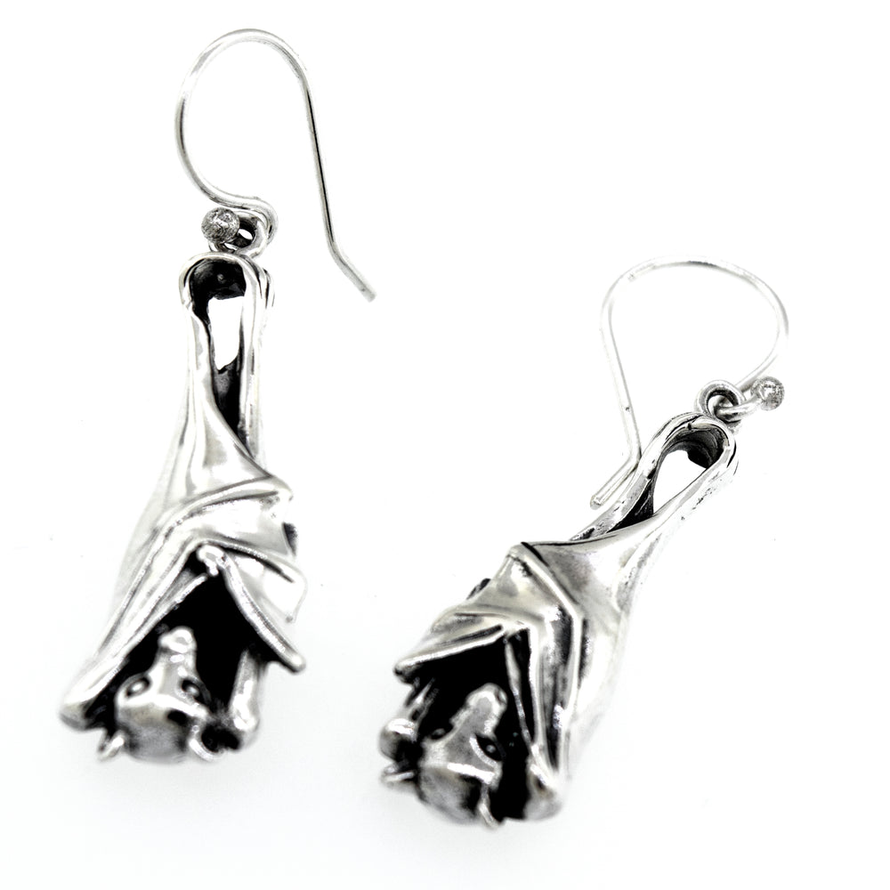 
                  
                    A pair of Super Silver Designer Bat Dangle Earrings on a white background.
                  
                
