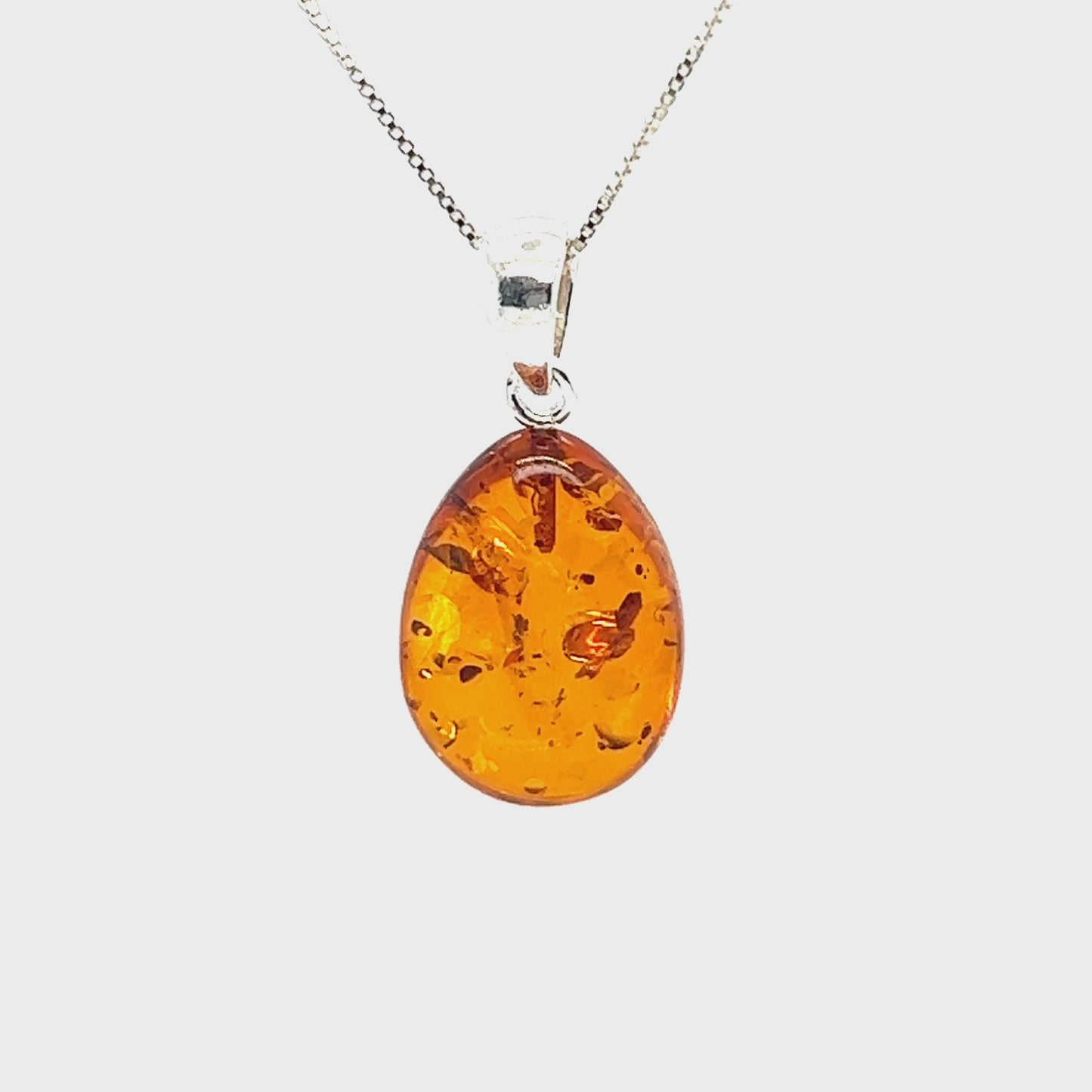 
                  
                    Load and play video in Gallery viewer, Teardrop Amber Pendant
                  
                