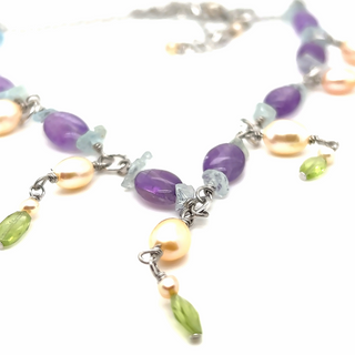 Multicolor Super Silver beaded necklace with an elegant touch of amethyst and pearl.
