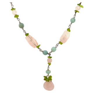 
                  
                    A Super Silver Beaded Multicolor Y-necklace with green leaves.
                  
                