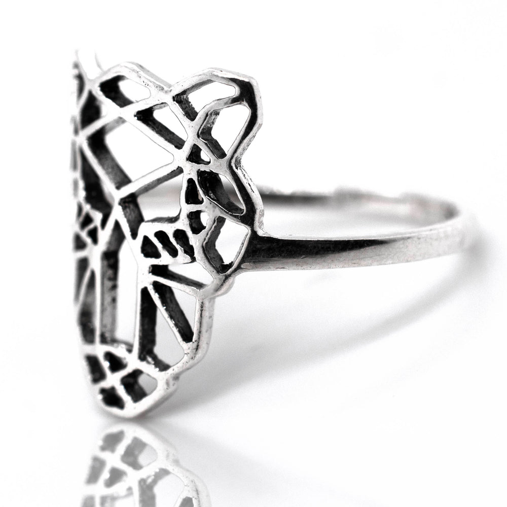 A Cut Out Jaguar Ring with an intricate design.