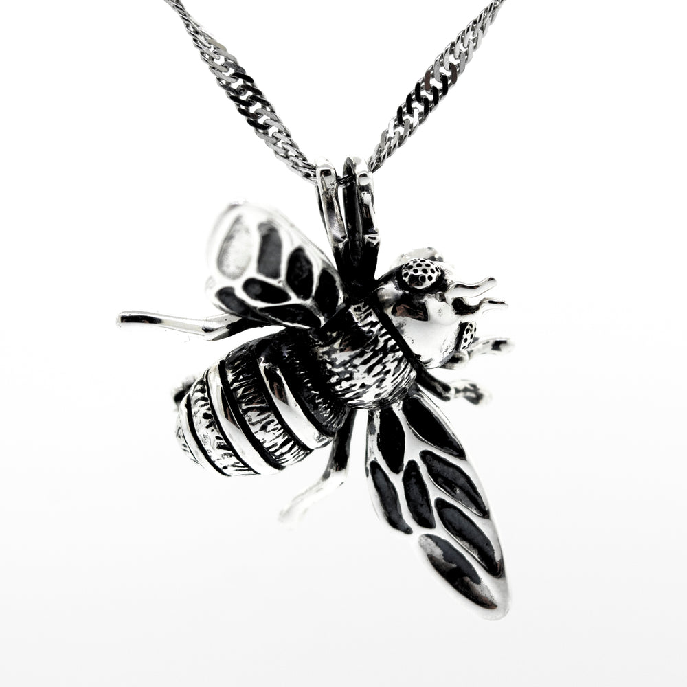 A Super Silver Stunning Sterling Silver Bee Pendant is shown on a white background.