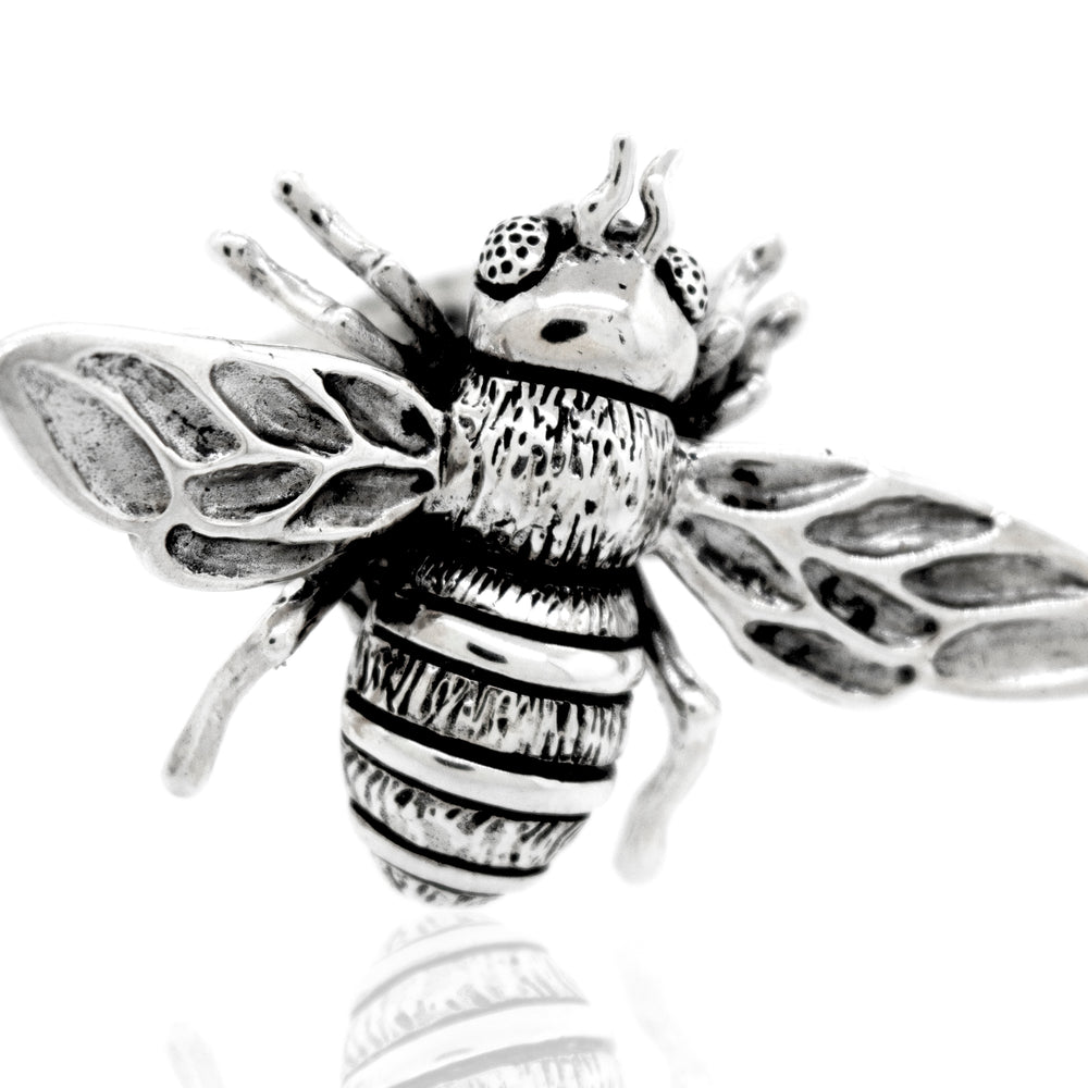 A handcrafted Super Silver Large Bee Ring on a white background.