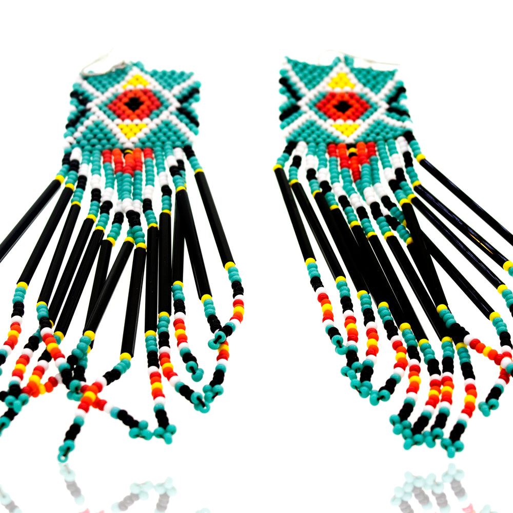 
                  
                    A pair of Super Silver Handmade Southwest inspired earrings adorned with colorful gemstone beads.
                  
                