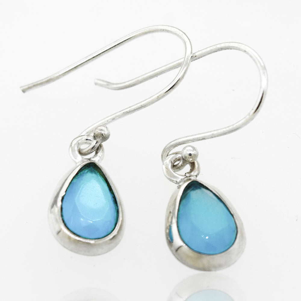 
                  
                    A pair of Simple Teardrop Shape Blue Chalcedony earrings with a Super Silver setting.
                  
                