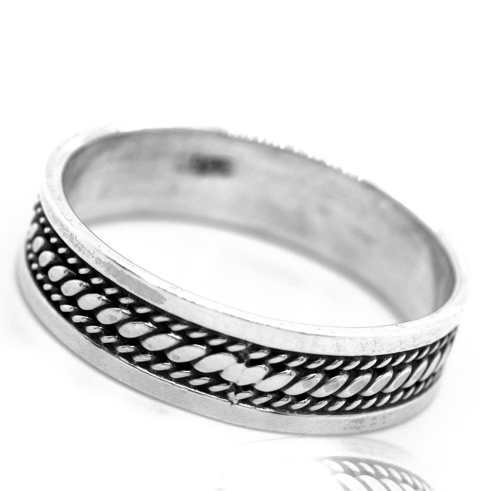 
                  
                    A wide silver Band with Etched Rope Pattern, perfect for everyday wear.
                  
                