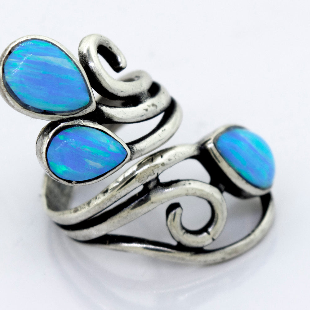 
                  
                    A Stunning Wrap-Around Opal Ring handcrafted with blue opal stones by Super Silver.
                  
                