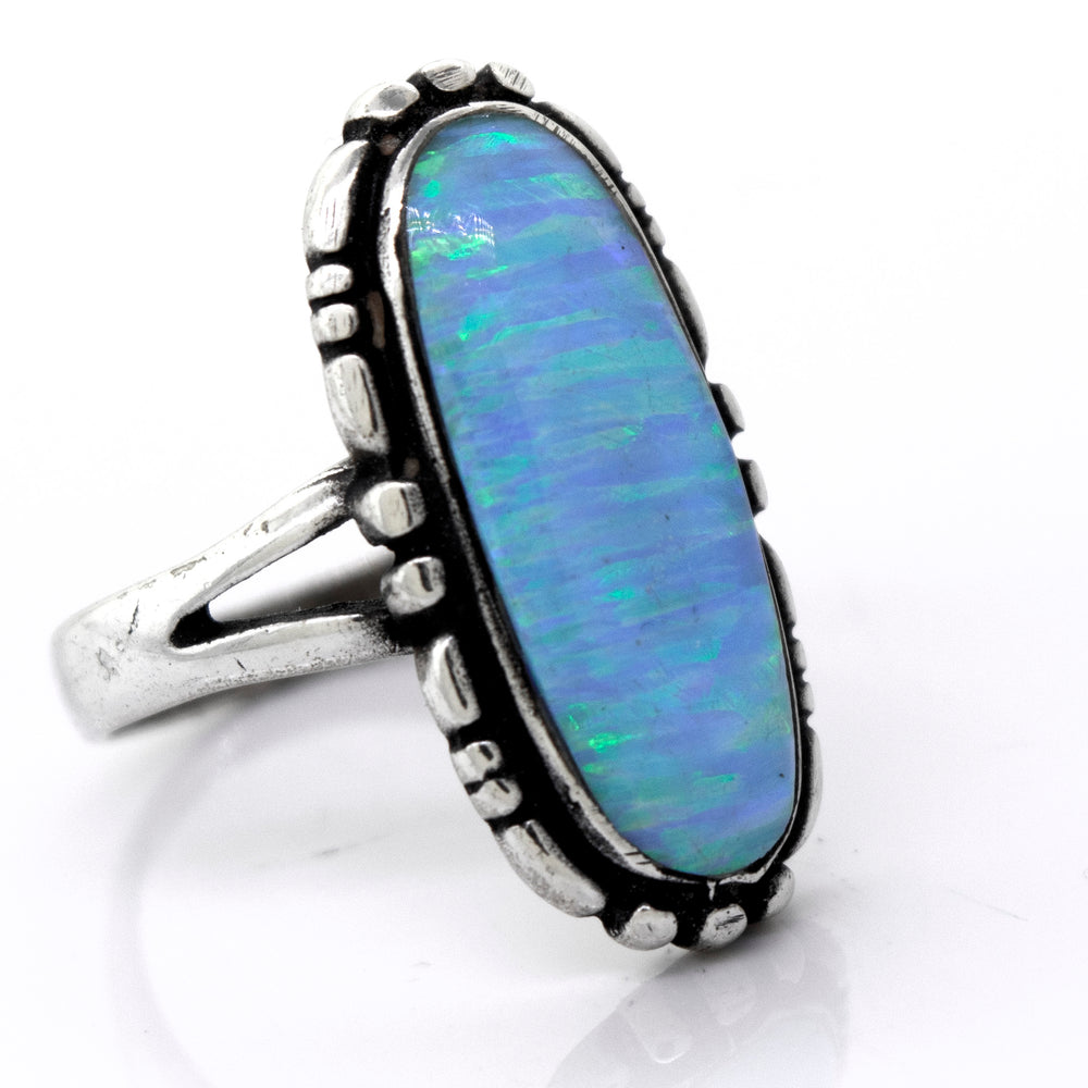 
                  
                    A Super Silver handcrafted American Made Oval Opal Ring with a southwestern-styled design on a white background.
                  
                