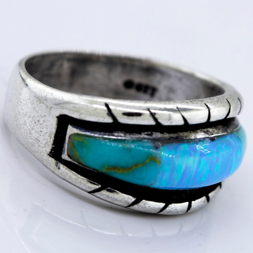 
                  
                    A Super Silver American Made Opal Inlay Ring with a turquoise stone.
                  
                