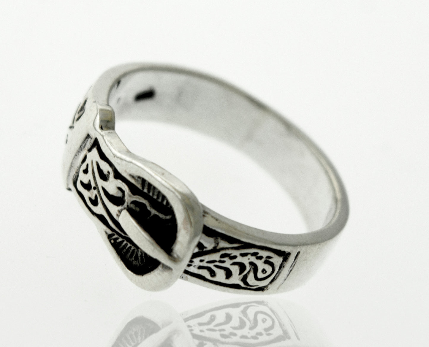 
                  
                    A Super Silver silver belt design ring with an intricate etching design.
                  
                