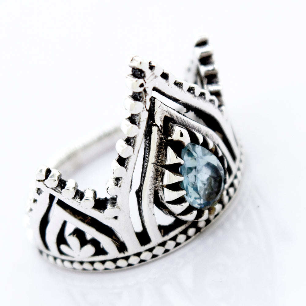 
                  
                    A Super Silver Crown Ring with Teardrop Shape Blue Topaz.
                  
                