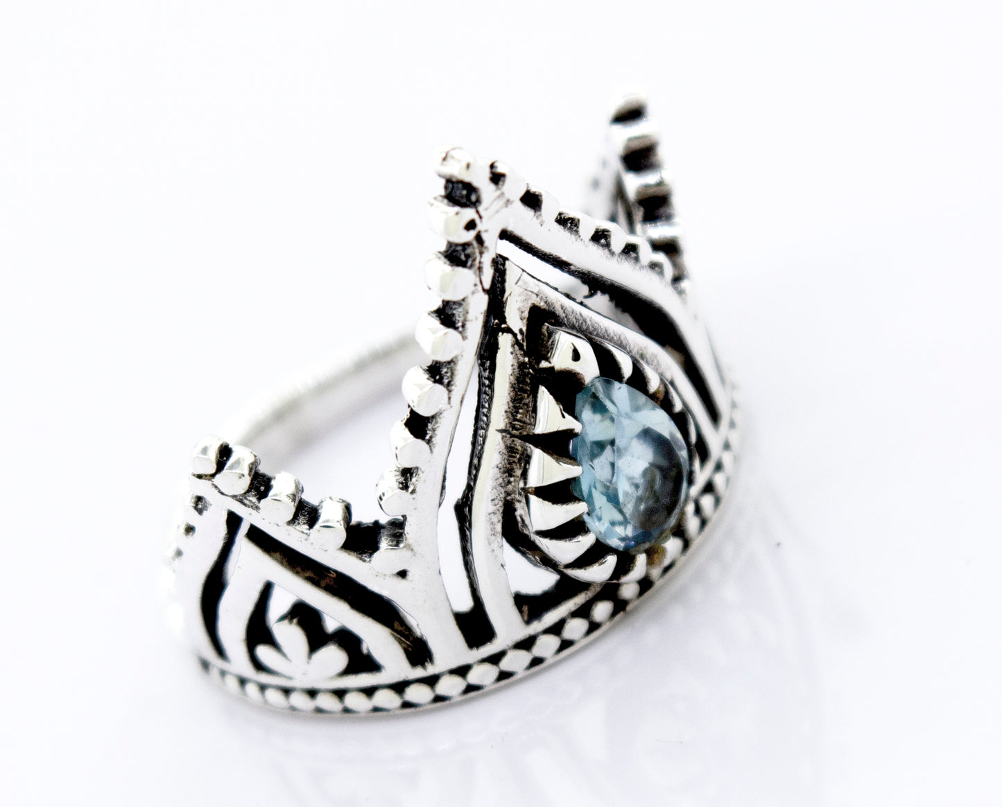 
                  
                    A Super Silver Crown Ring with Teardrop Shape Blue Topaz.
                  
                