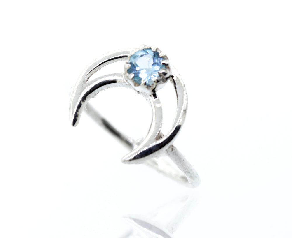 A Super Silver designer Online Only Exclusive Moon Design Blue Topaz Ring.