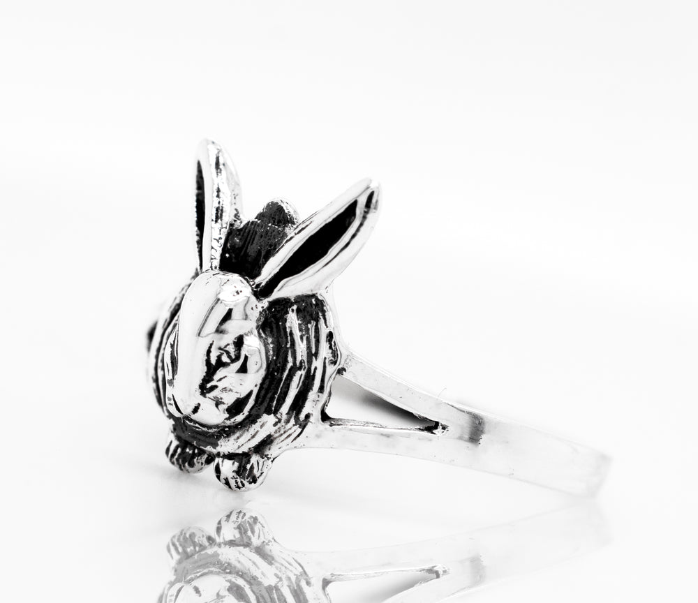 
                  
                    An oxidized sterling silver Rabbit Ring with a rabbit shape design by Super Silver.
                  
                