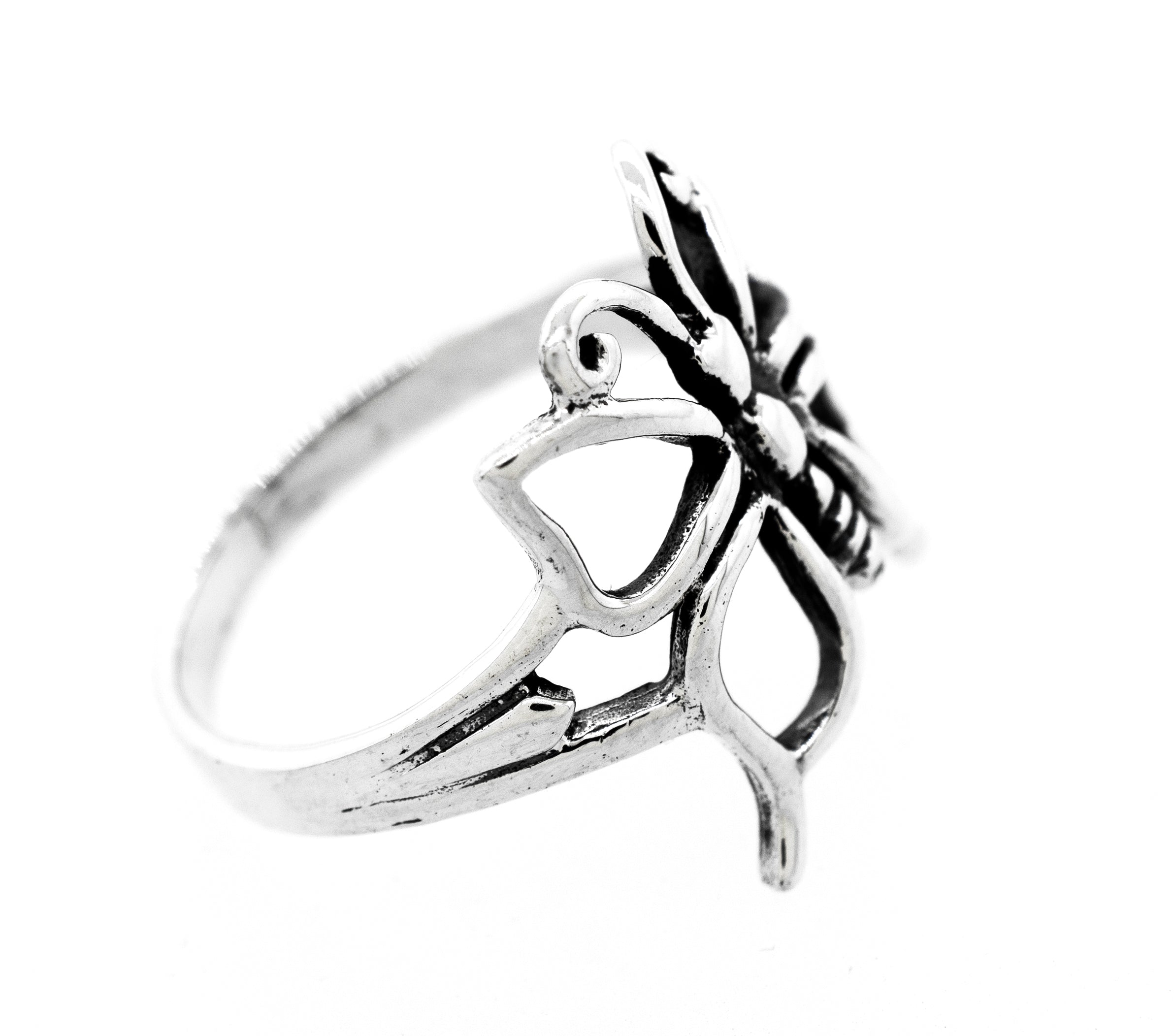 A statement Charming Cutout Butterfly Ring with a filigree butterfly design.