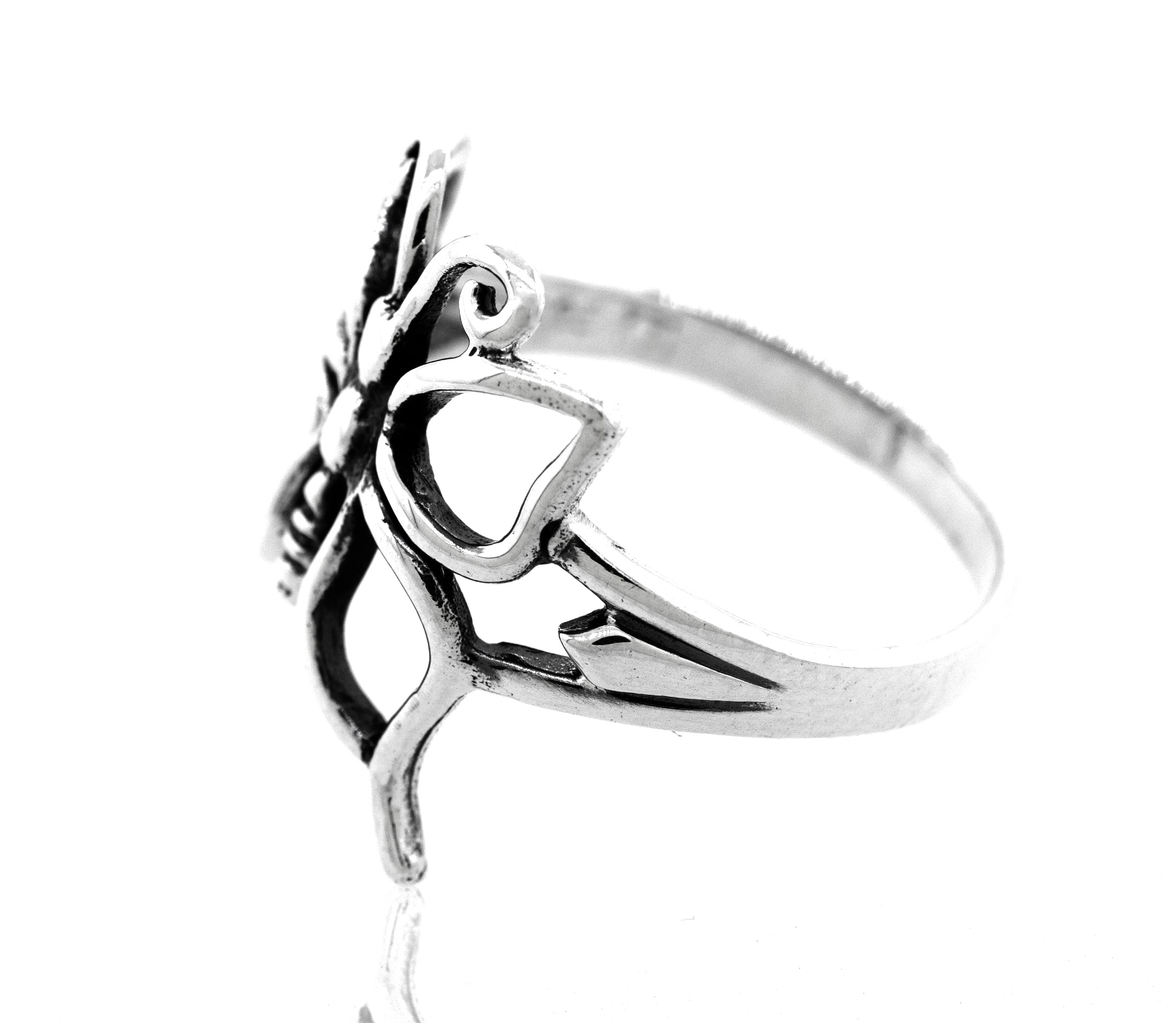A minimalist Charming Cutout Butterfly Ring with a delicate butterfly filigree.