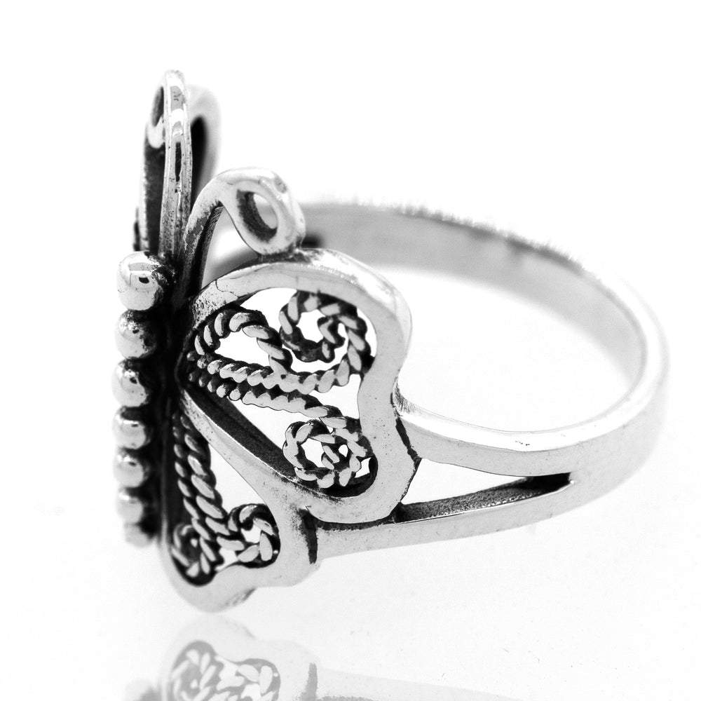 
                  
                    A statement Filigree Butterfly Ring with a butterfly design.
                  
                