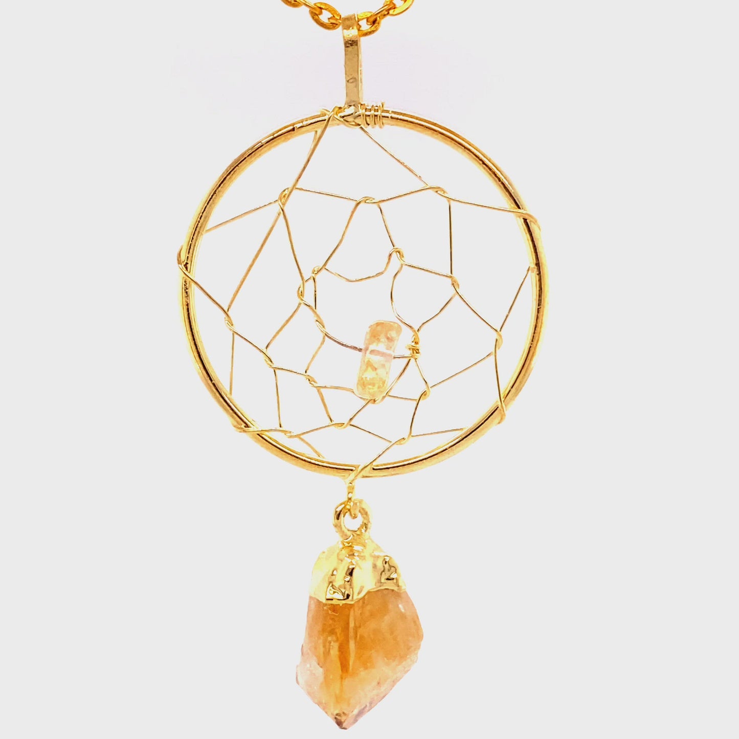 
                  
                    Load and play video in Gallery viewer, Gold Dreamcatcher Pendant with Gemstone Point
                  
                