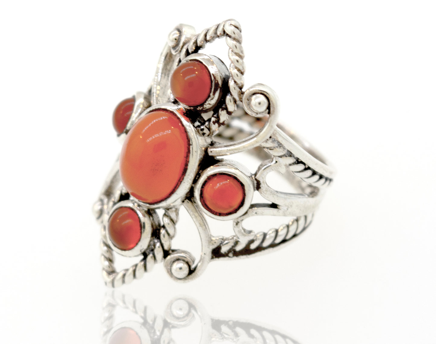 
                  
                    A Super Silver sterling silver ring adorned with a vibrant red coral stone, available at our trusted online store.
                  
                