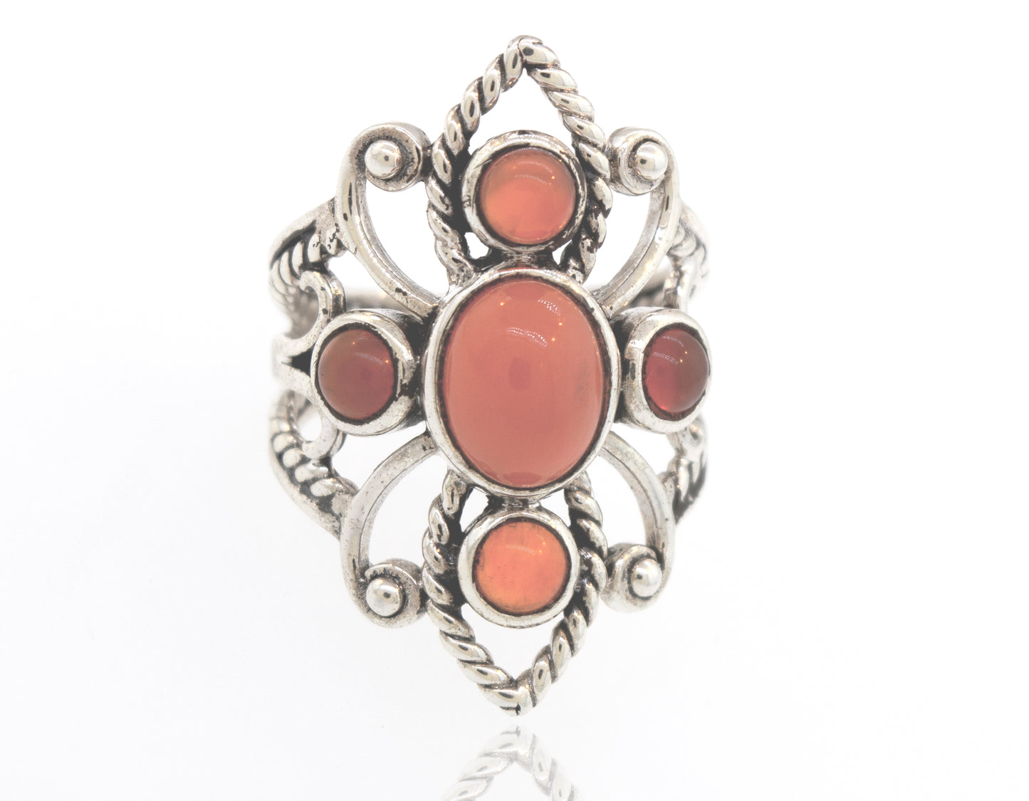 
                  
                    A Super Silver sterling silver ring with a coral stone in the center, available in our online store.
                  
                