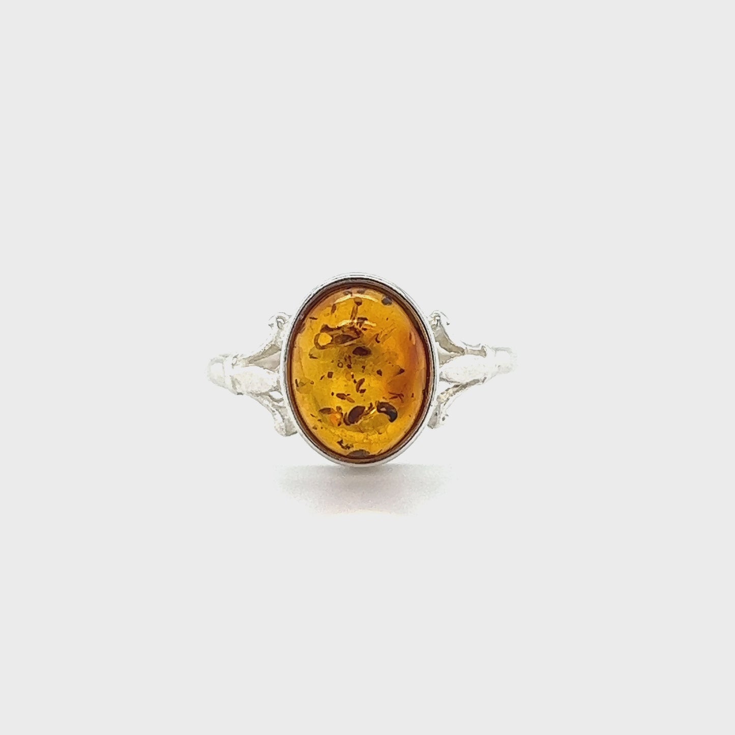 
                  
                    Load and play video in Gallery viewer, Glowing Oval Amber Ring
                  
                
