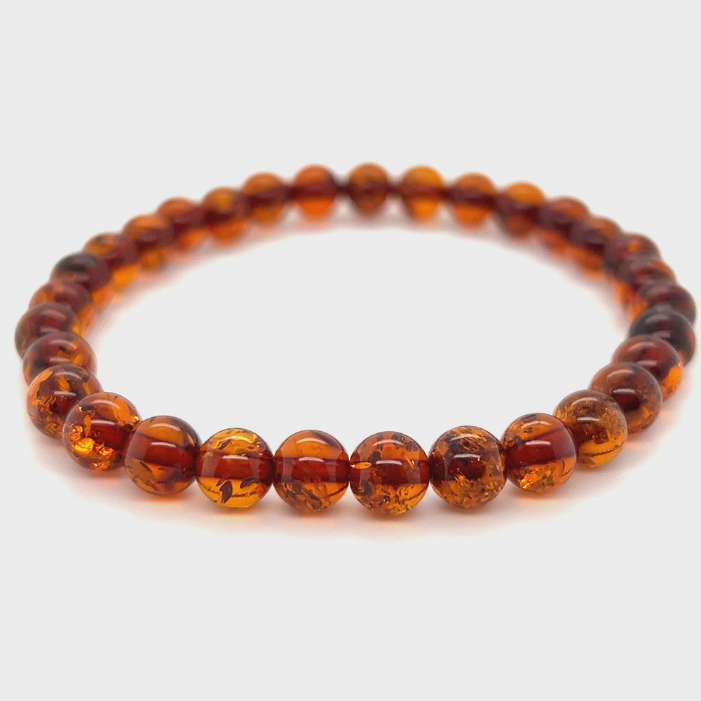 
                  
                    Load and play video in Gallery viewer, Boho-Chic Amber Bead Bracelet
                  
                