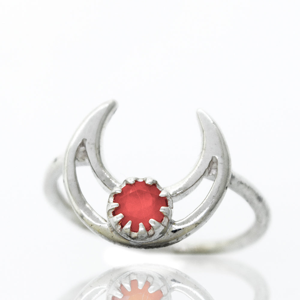 
                  
                    A Super Silver Online Only Exclusive Moon Design Carnelian Ring with a vibrant carnelian stone in a moon shape setting.
                  
                