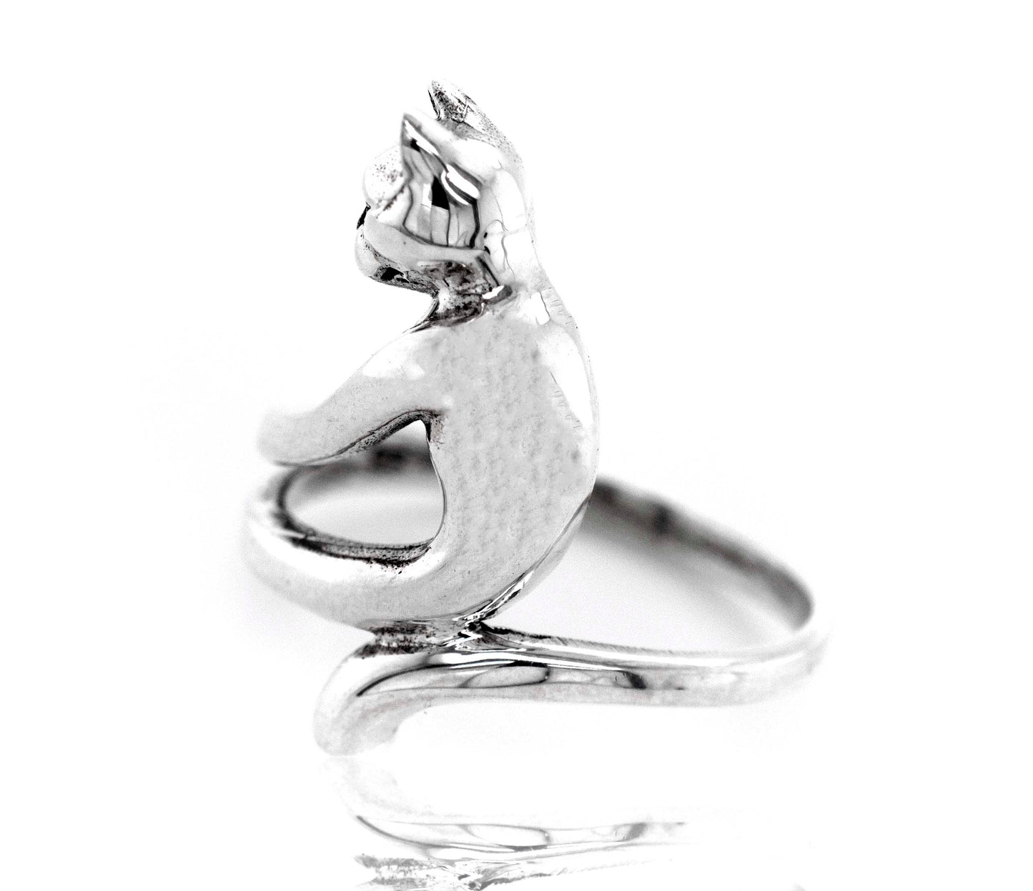 A minimalist Cat Ring with a cat sitting on it.