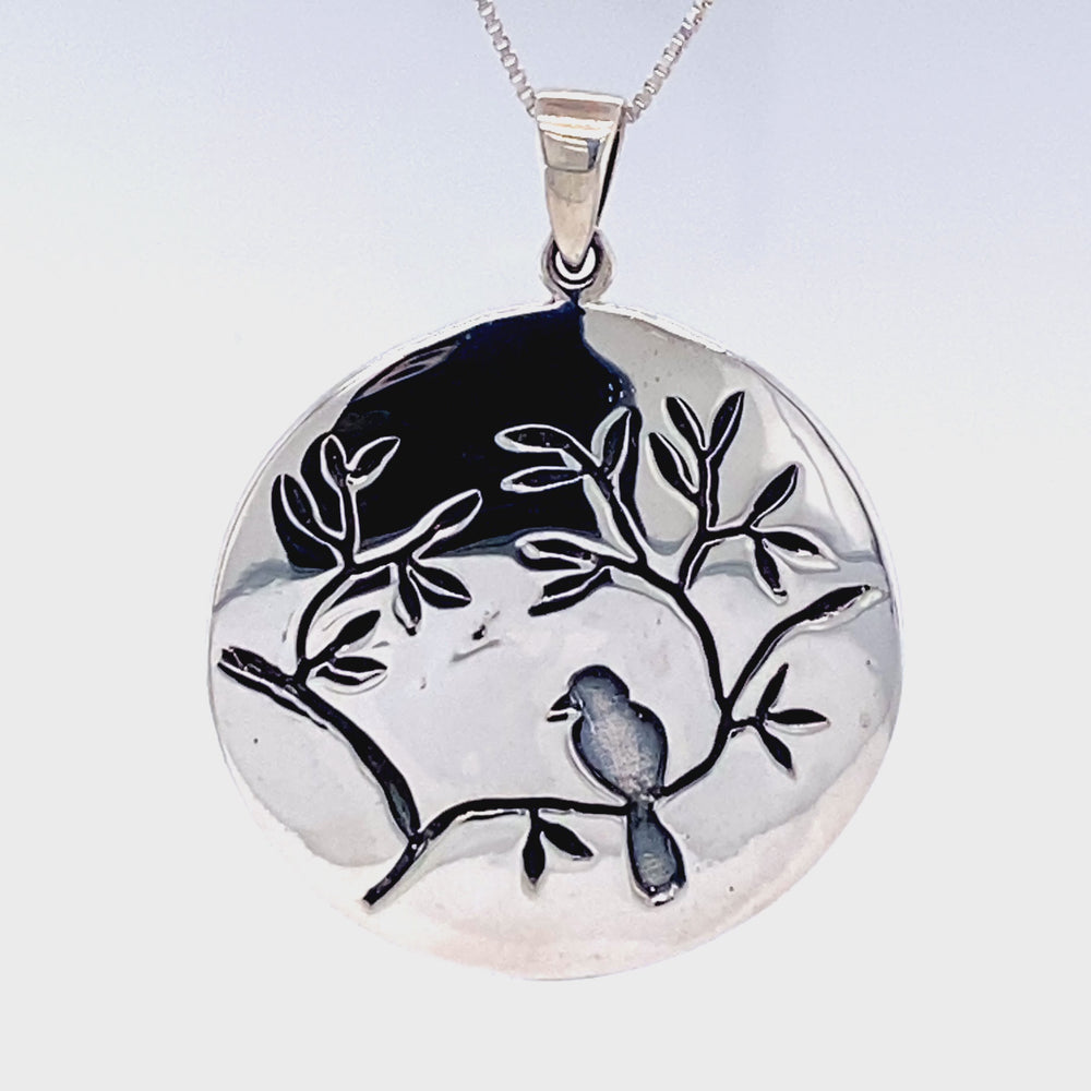 
                  
                    Load and play video in Gallery viewer, Large Circle Nature Pendant with Bird
                  
                