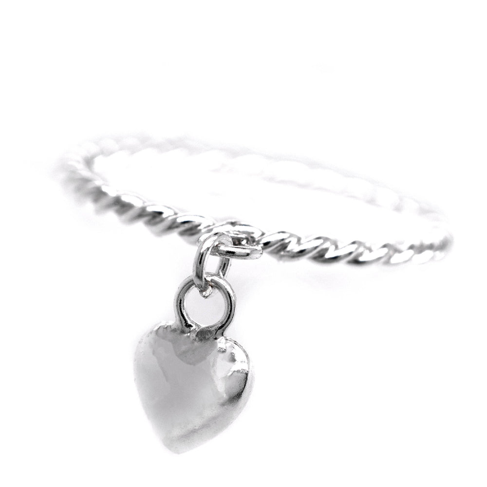 
                  
                    A minimalist design Super Silver Heart Charm Ring With Rope Band that is perfect for stacking.
                  
                