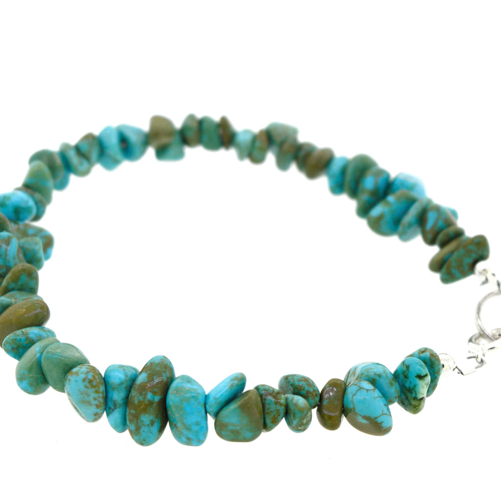 
                  
                    A Southwest Colorado Turquoise Chip Bracelet with a Super Silver clasp, showcasing the southwest charm.
                  
                