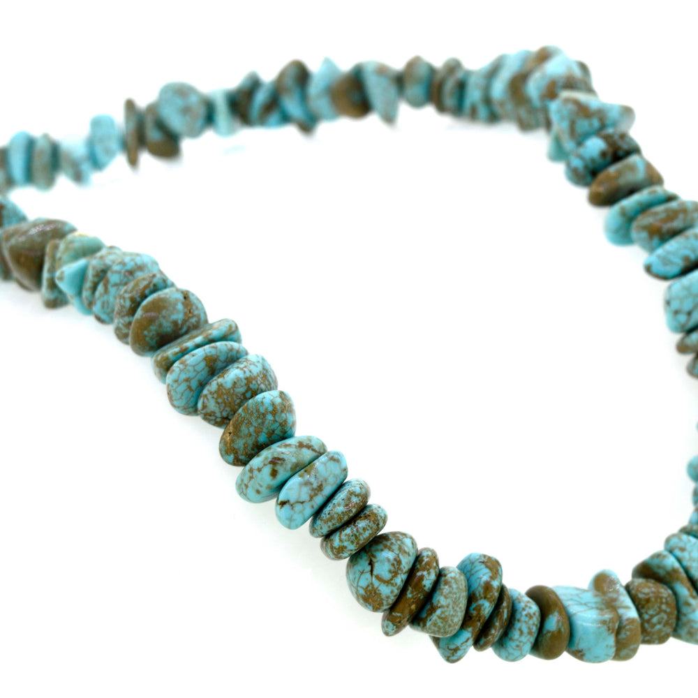 
                  
                    A Dreamy Colorado Turquoise Beaded Necklace by Super Silver with brown stones perfect for daily life.
                  
                