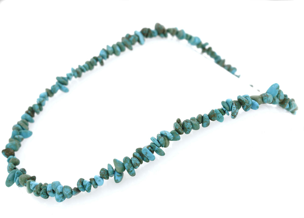 A Southwest Colorado Turquoise Chip Necklace with Super Silver turquoise stones on a white background.