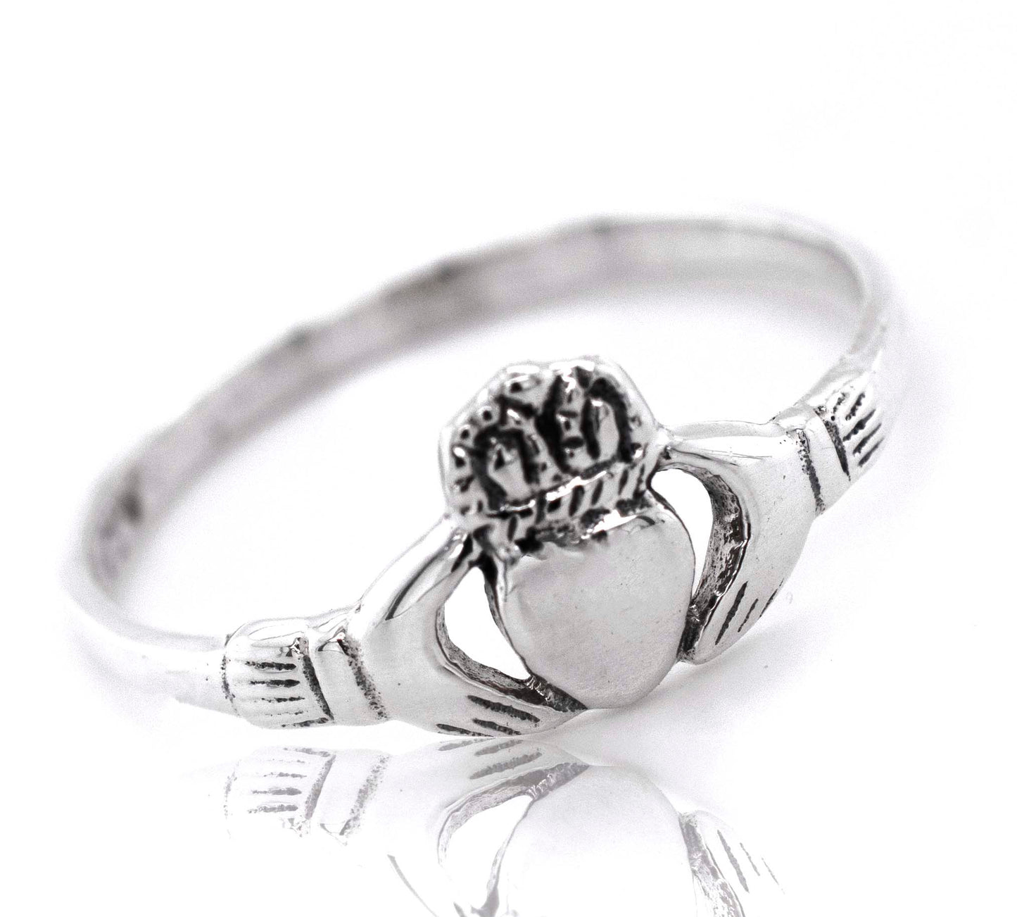 
                  
                    A Claddagh Ring with a heart on it, symbolizing love.
                  
                