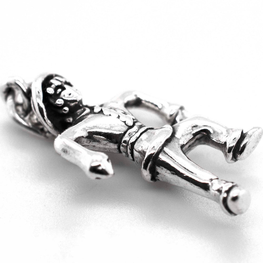 A Dancing Scarecrow Charm made by Super Silver, depicting a scarecrow figure.