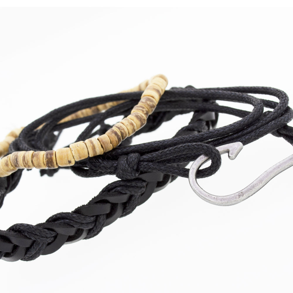 
                  
                    A Three Bracelet Set with a wooden hook and faux leather accents.
                  
                