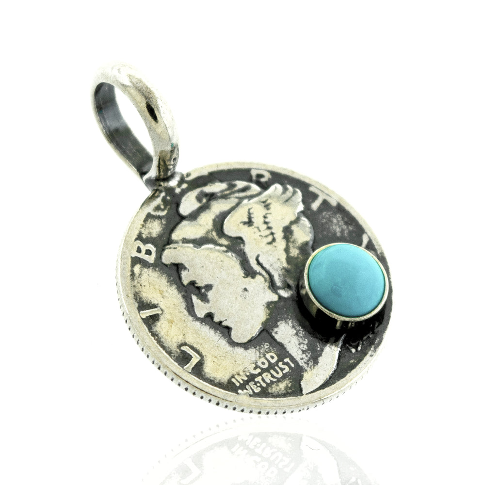
                  
                    A Super Silver Dime Pendant With A Round Turquoise adorned with a turquoise stone.
                  
                