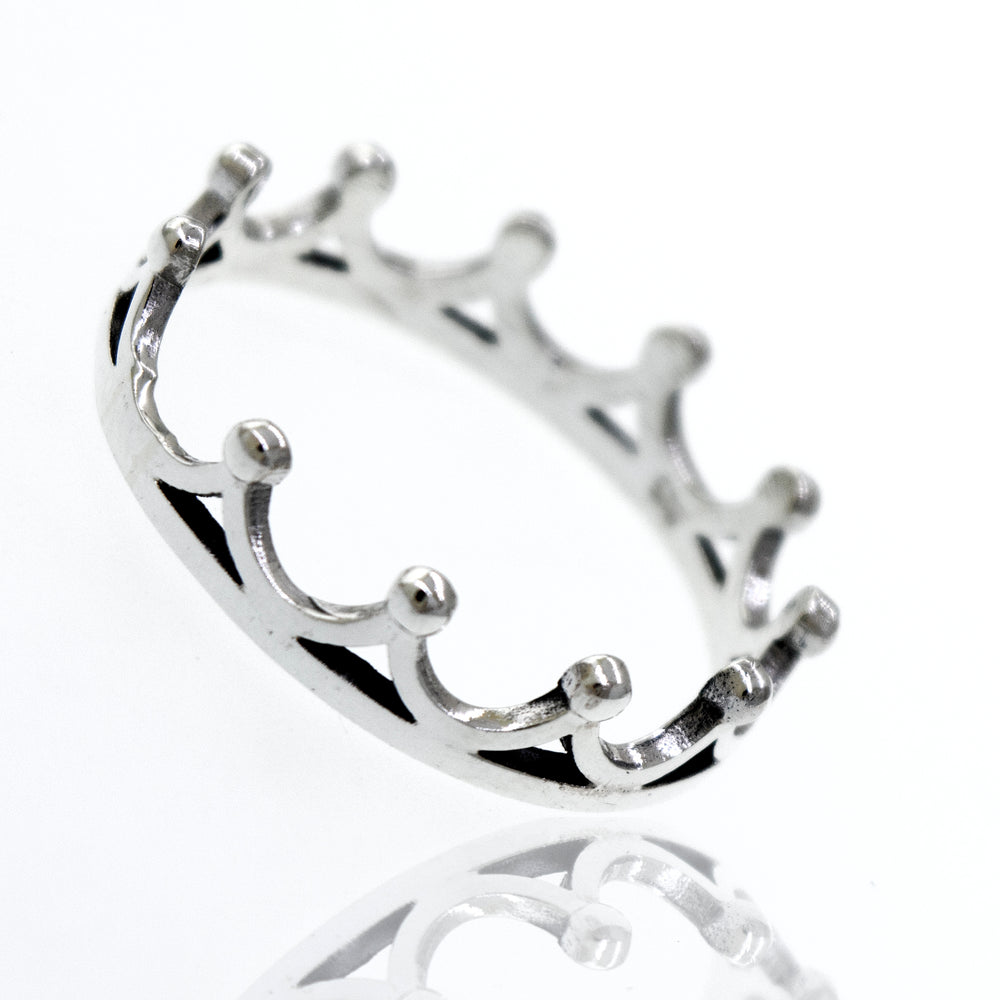 
                  
                    A high polish Super Silver Sterling Silver Crown Ring on a white surface.
                  
                