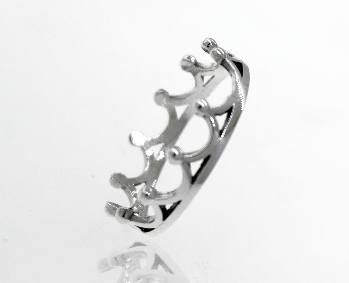 
                  
                    A high polish Super Silver Sterling Silver Crown Ring resting on a white surface.
                  
                