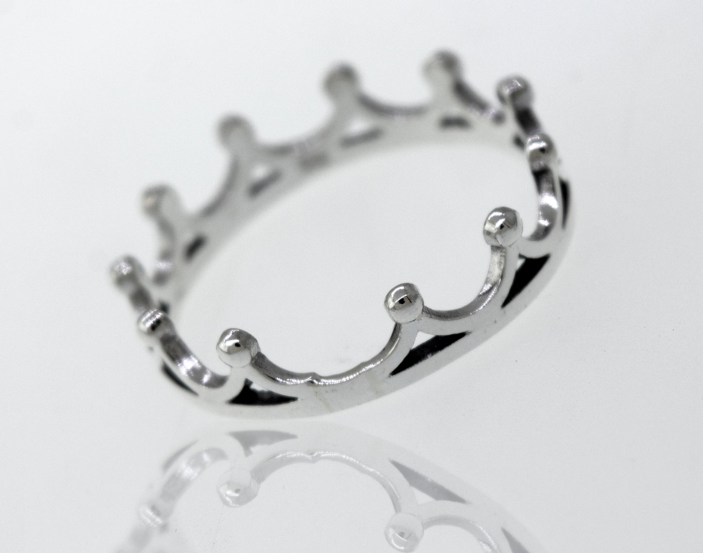 
                  
                    A Super Silver Sterling Silver Crown Ring with a high polish finish, resting on a white surface.
                  
                