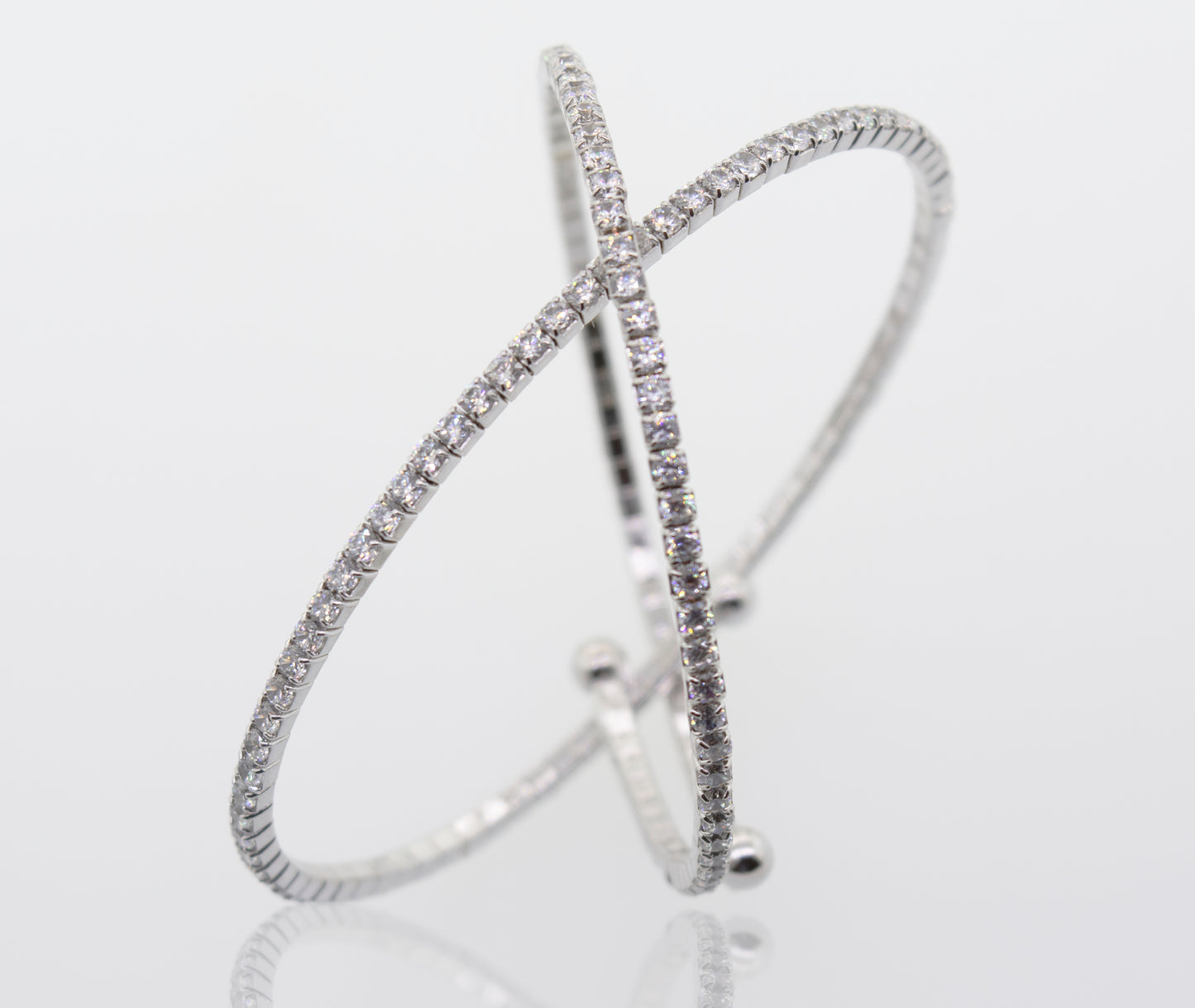 
                  
                    An elegant Cubic Zirconia Simple Wrap Bracelet with diamonds, offered in various lengths by Super Silver.
                  
                